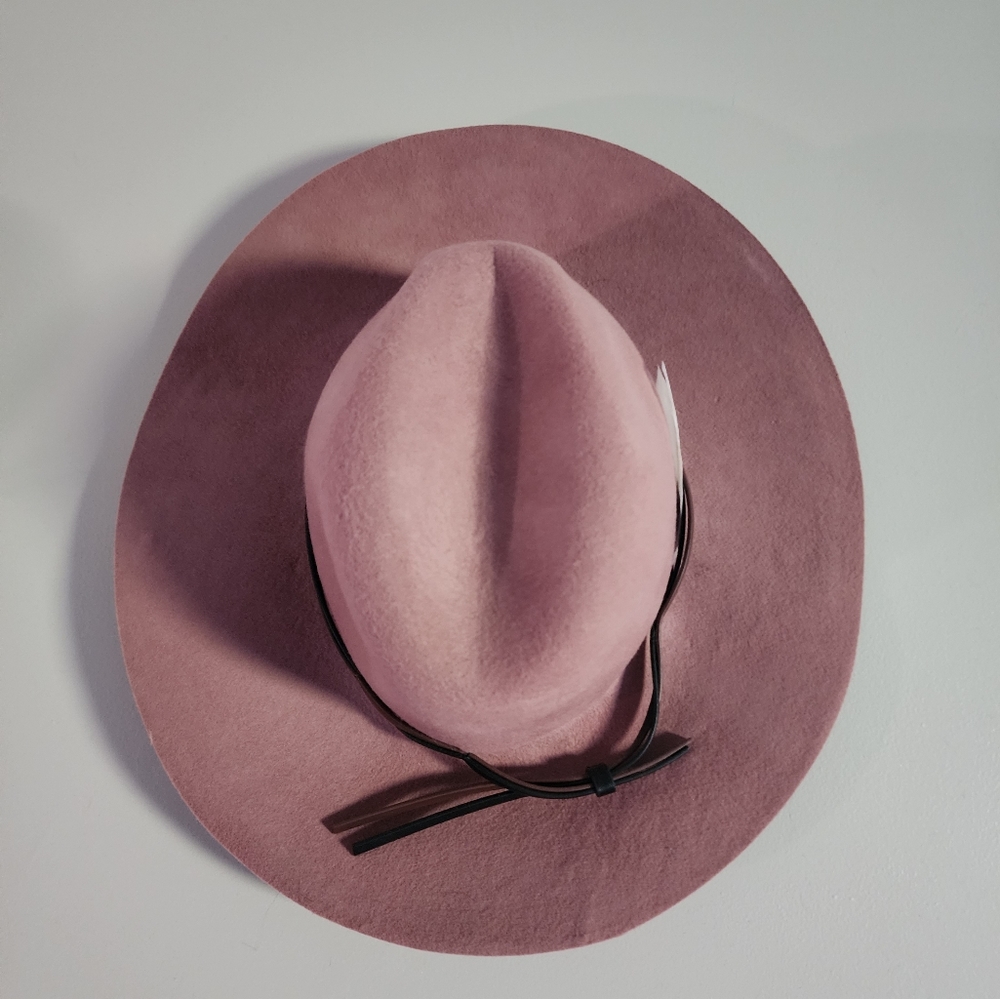 Pink fedora with added feather